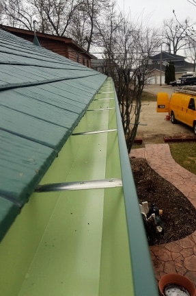 Seamless Gutters 287x432 - Gutters